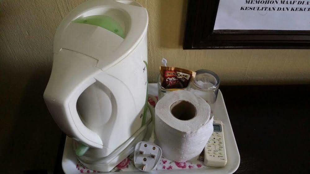 Hji Residensi Hotel Kuah Bagian luar foto